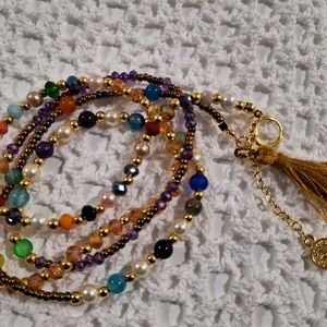 Multicolor 5-strand bracelet, which can be used as a long or short necklace.